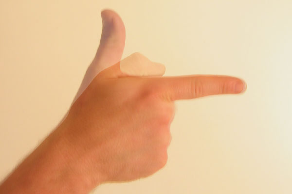 "Gesture thumb up then down forefinger out like gun" by User Jeremykemp on en.wikipedia - Jeremykemp. Licensed under CC BY-SA 3.0 via Wikimedia Commons - https://commons.wikimedia.org/wiki/File:Gesture_thumb_up_then_down_forefinger_out_like_gun.jpg#/media/File:Gesture_thumb_up_then_down_forefinger_out_like_gun.jpg