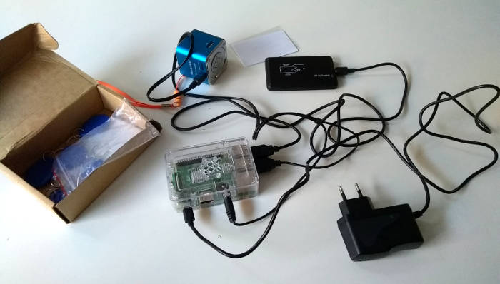 My Raspberry Pi 3, a M302 Mifare RF ID Reader, and a USB audio box.